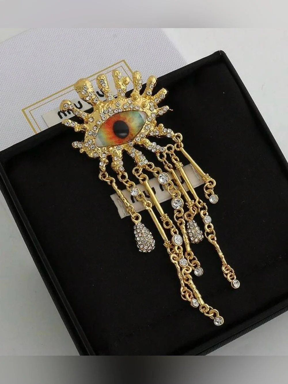 Schiaparelli Inspired Gold Evil Eye Fringe Brooch with Crystal Accents